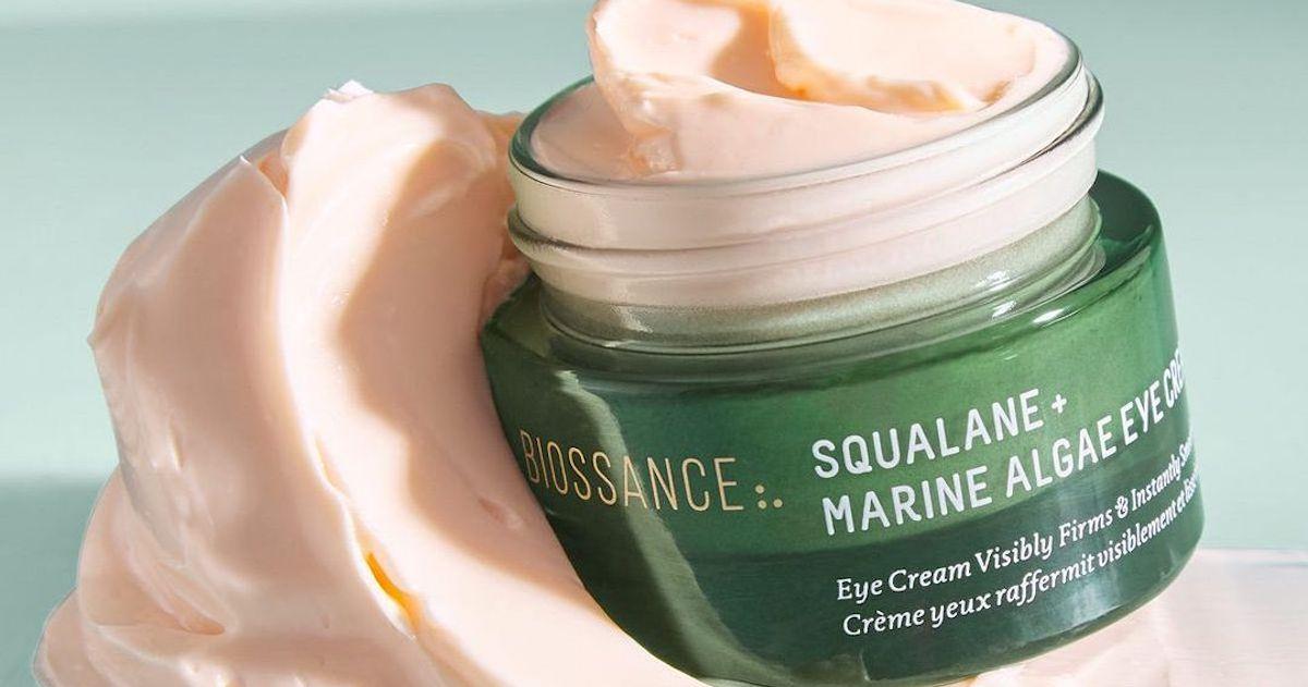 Biossance Squalane + Marine Algae Eye Cream in a green jar.