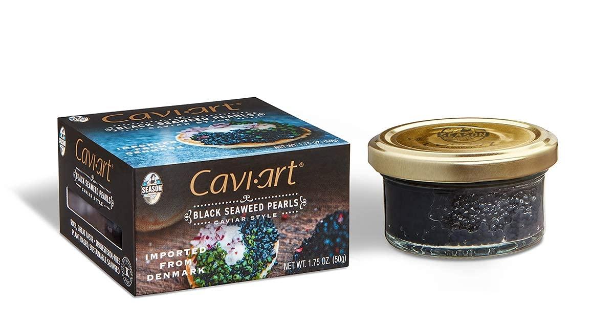 A box of Caviart next to a jar of seaweed pearls.