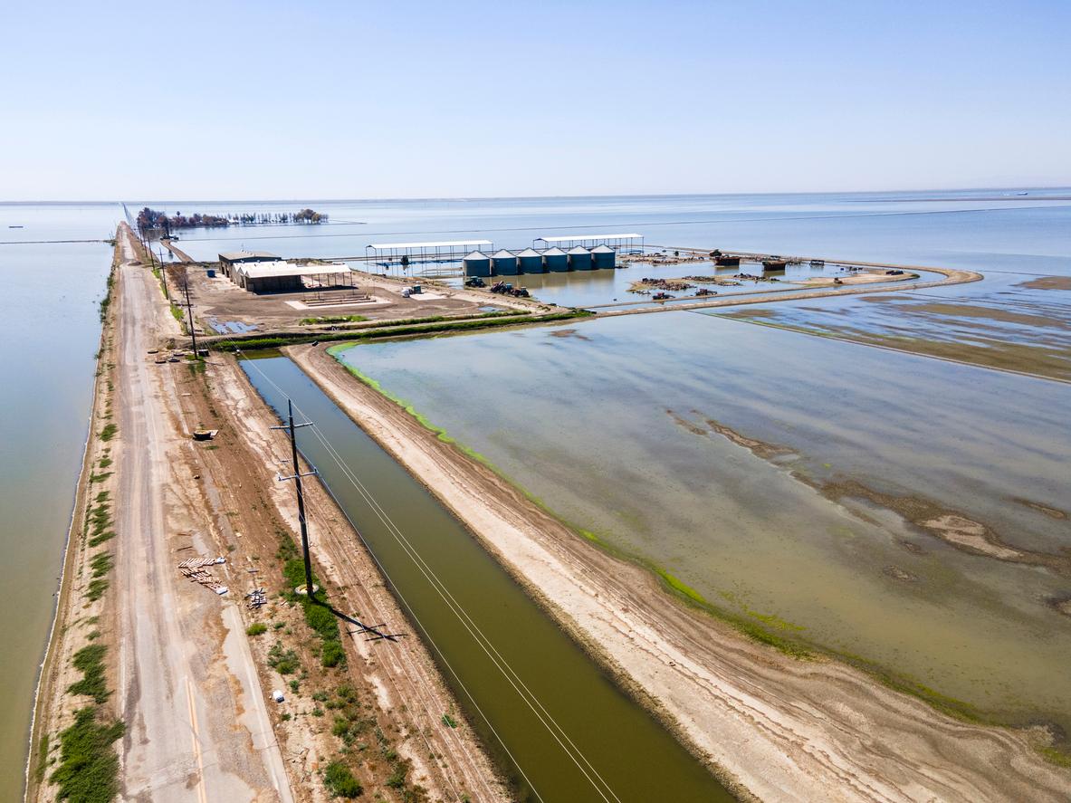 Tulare Lake appears flooding the streets and roads in a portion of the San Joaquin Valley in California in the summer of 2023.