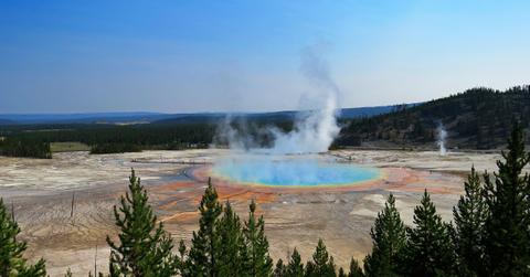 One of Yellowstone's thermal pools emits steam into the air