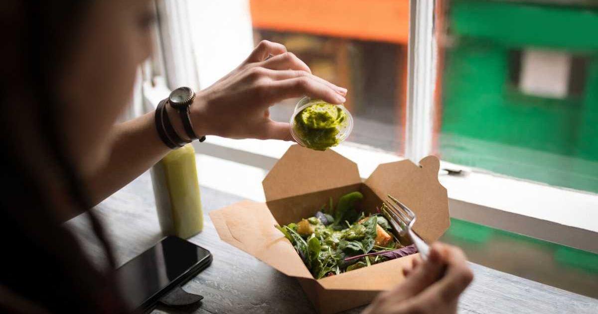 Woman eating from a box of pre-packaged salad (Representative Cover Image Source: Freepik)