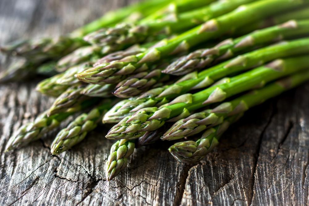 Asparagus on a wooden table.