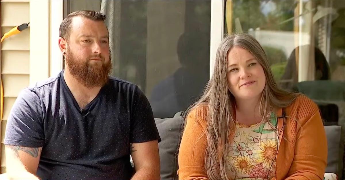 Greg and Michelle Stream sit on their porch, talking to a camrea