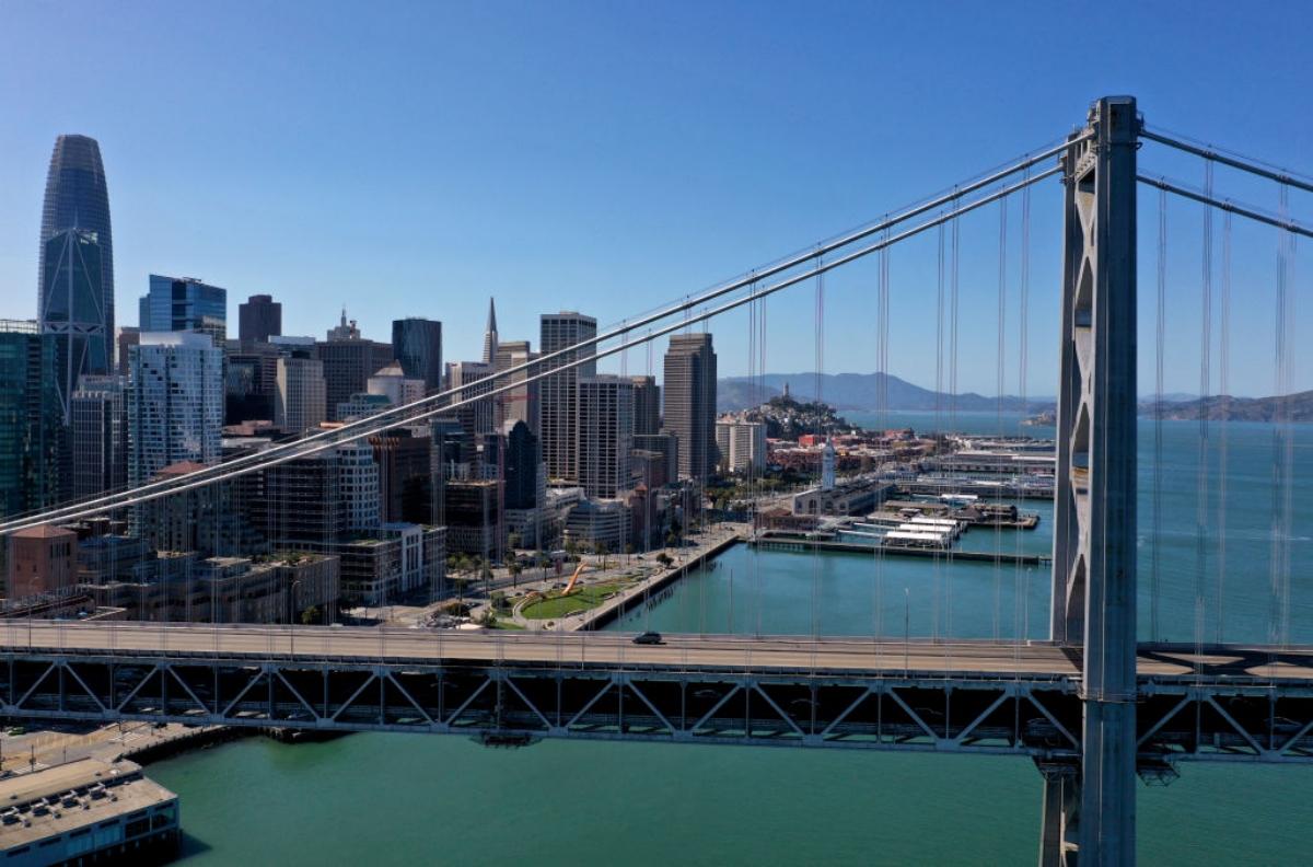 single car driving on Golden Gate Bridge in 2020