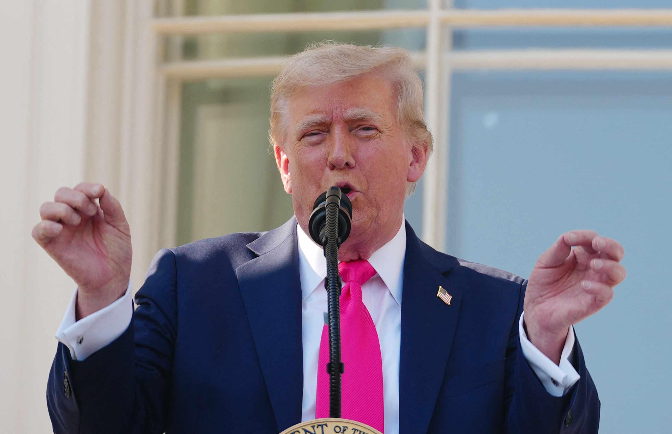 President Donald Trump speaks to military personnel at a military family picnic at the White House on July 4.