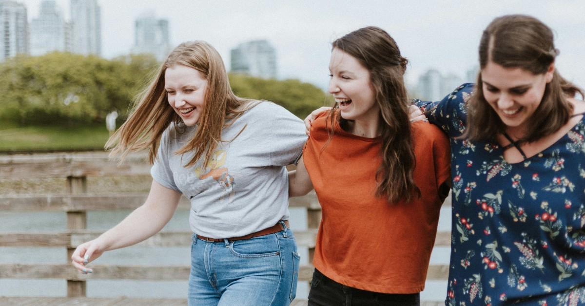 A group of teen girls laugh together