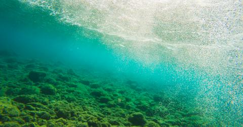 what causes seafloor spreading