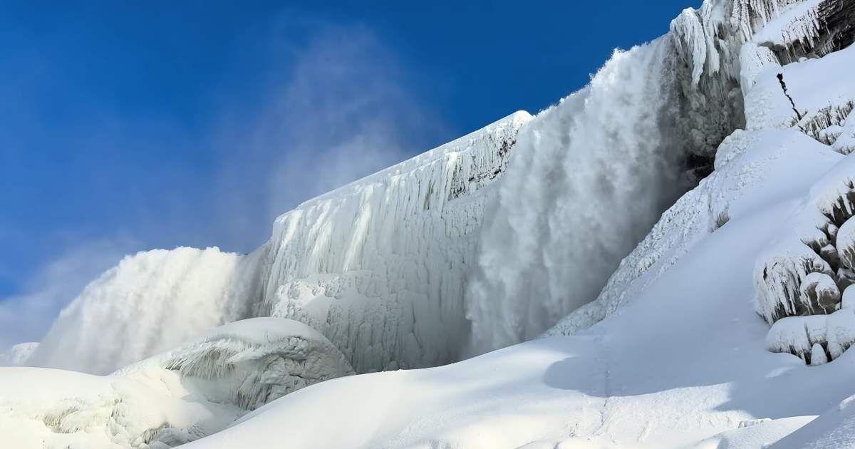 Screenshot from a video taken on February 2, 2026, showing Niagara Falls appearing frozen after extreme cold. (Cover Image Source: YouTube | @BuffaloSnowKing)