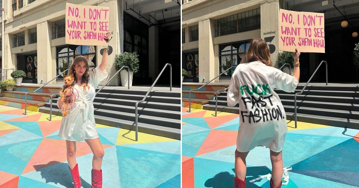 Lexy Silverstein wears a robe and holds up a sign that says "No, I don't want to see your Shein haul" in front of Shein's headquarters