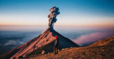 A man looking at a volcano. (Representative Cover Image Source: Getty Images | EyeEM Mobile GmbH)