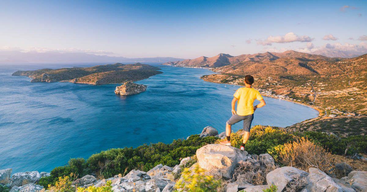 A man looking at an island off the coast. (Representative Cover Image Source: Getty Images | Roberto Moiola/Sysaworld)