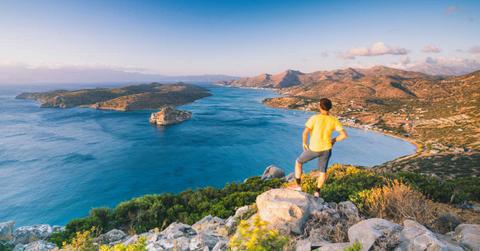 A man looking at an island off the coast. (Representative Cover Image Source: Getty Images | Roberto Moiola/Sysaworld)