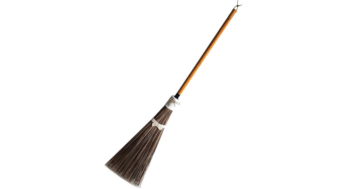 broom with coconut husk bristles and wooden handle