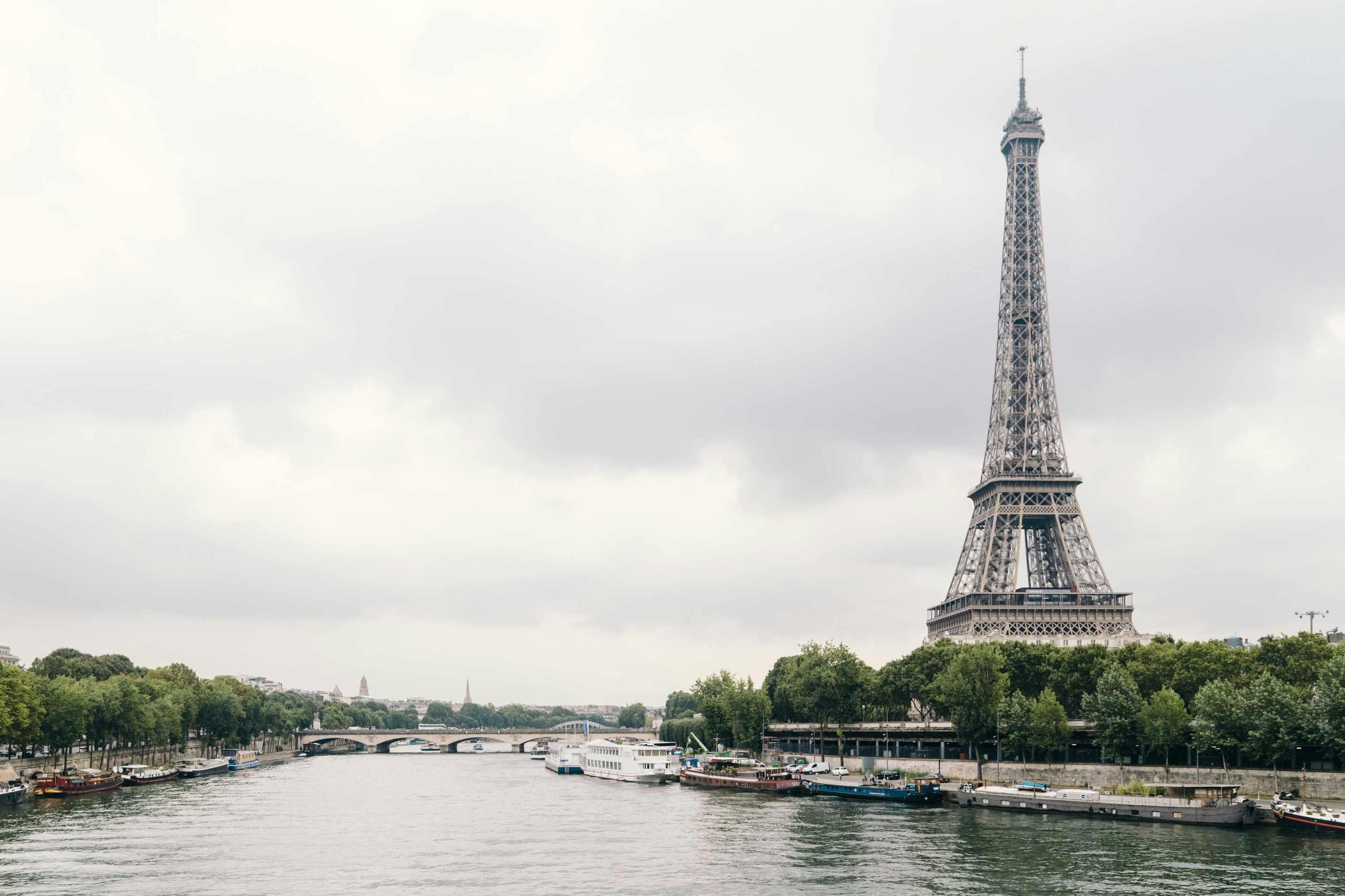 The Eiffel Tower is pictured on a cloudy day.