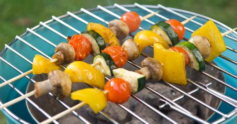 A veggie kabab on an outside grill.
