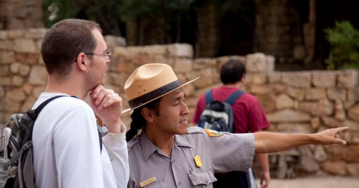 A park ranger is guiding a tourist at a national park. (Representative Cover Image Source: Getty Images | mattjeacock)