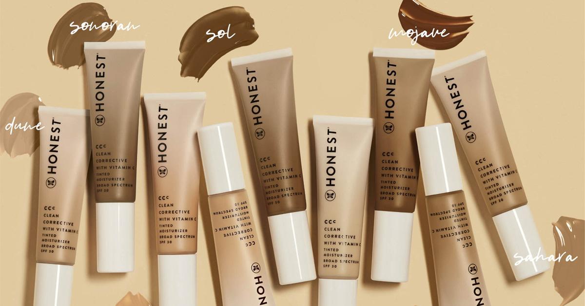 A collection of tinted moisturizers on a tan background