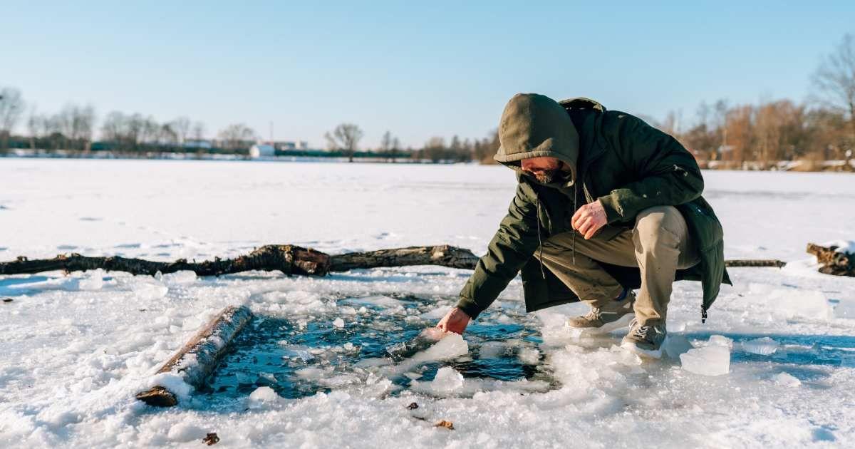 A scientist is collecting samples from a frozen region in the Arctic. (Representative Cover Image Source: Getty Images | Olga Rolenko)