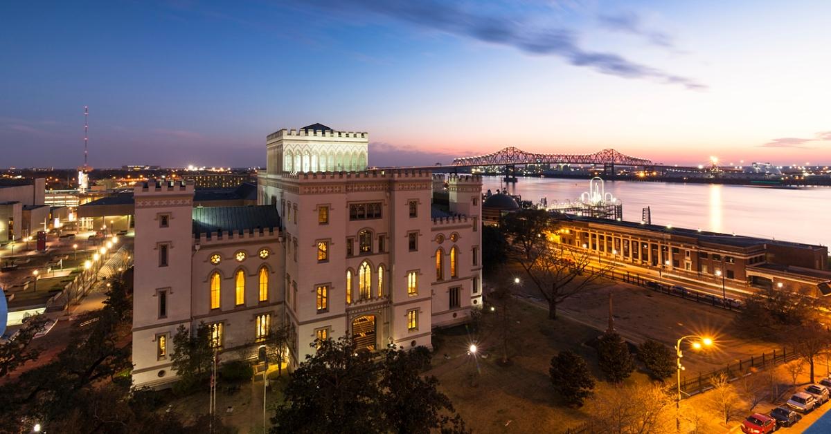 Photo of the outside of Louisiana's Old State Capitol at night