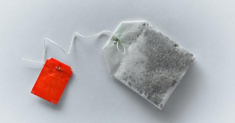 A tea bag with a red tag