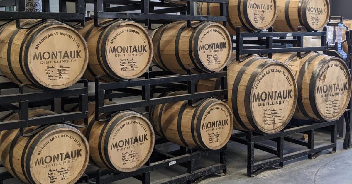 Photographs of barrels of Montauk Distilling Co. liquor.