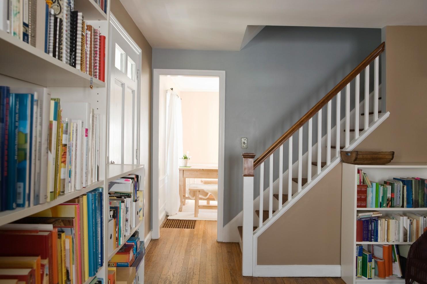 A clean and organized home with no objects obstructing the stairs, books are neatly organized and put away, and any vents or exits are free and clear.