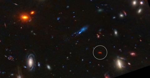 Distant Galaxy Y1 spotted by ALMA telescope reveals intriguing mysteries of early universe (Cover Image Source: Facebook | ALMA Observatory)