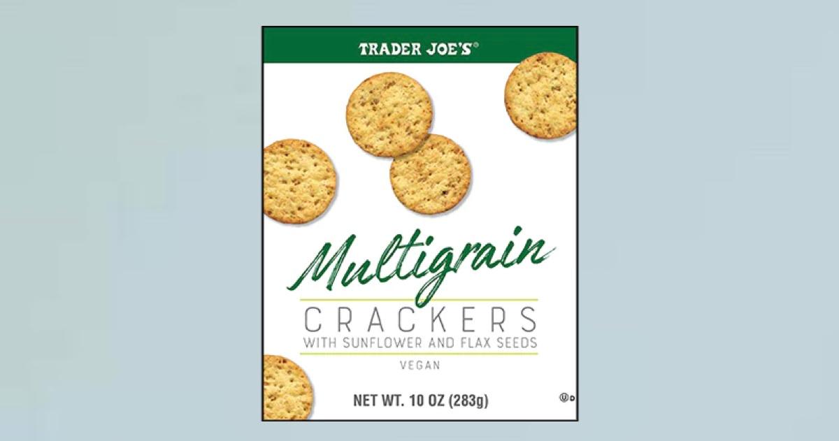 A box of Trader Joe's Multigrain Crackers with Sunflower and Flax Seeds on a blue background