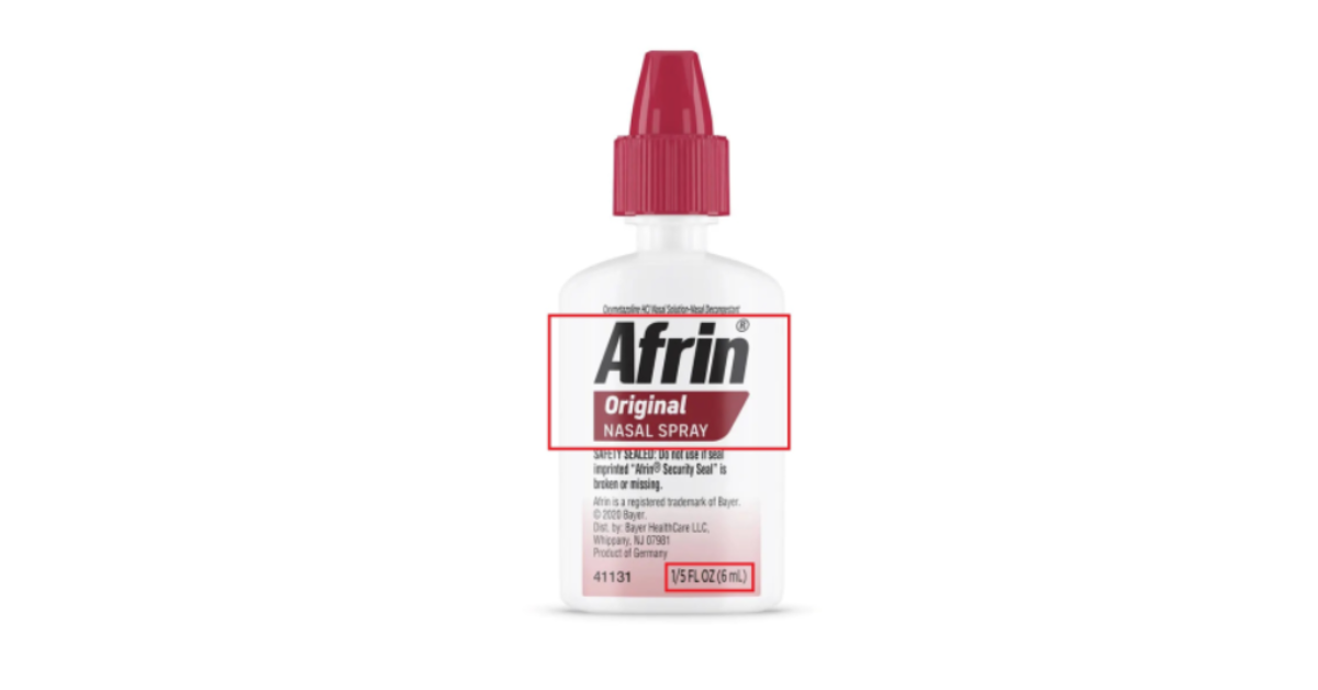 A bottle of Afrin nasal spray sits against a white background