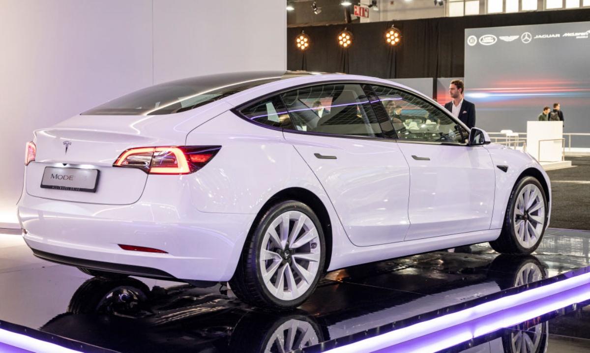 White Tesla Model 3 at car show