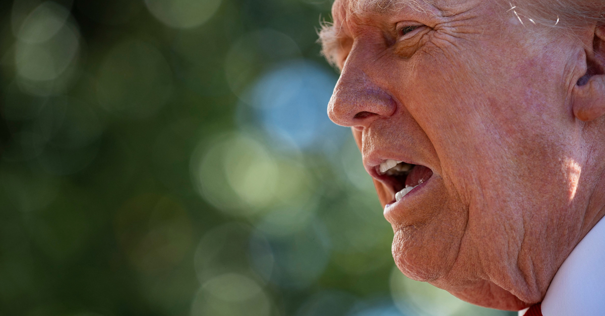 Donald Trump talks to reporters