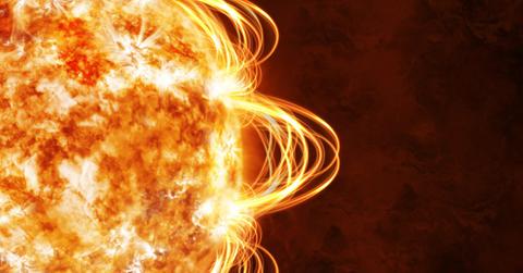 Closeup view of the sun's surface as a massive solar flare erupts