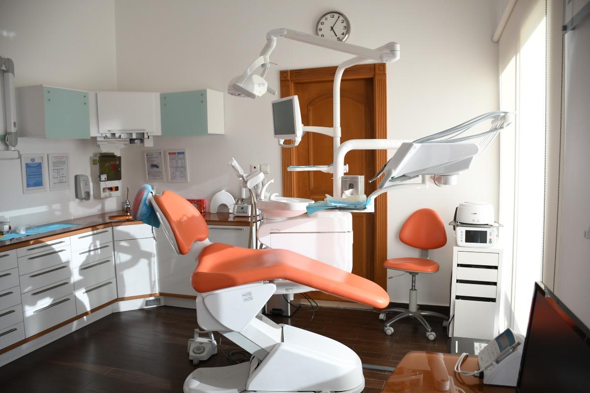 Dental examination chair in office.