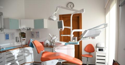 Dental examination chair in office.