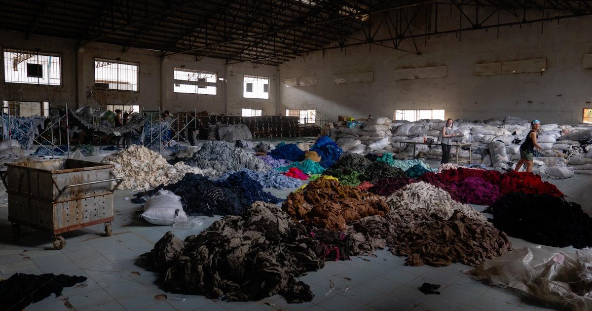 Discarded textiles being sorted