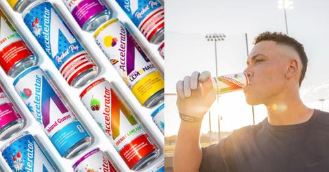 A display of diagonal Accelerator Energy drink cans photographed in front of a white background (left). A man stands outside while drinking an Accelerator Energy drink, backlit by the sunlight.