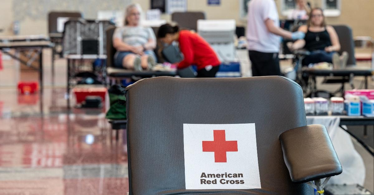 People donating blood at a Red Cross blood drive. 