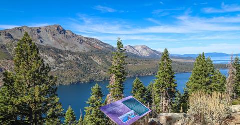 Interpretive signage on a trail in Lake Tahoe with mountain view in the background