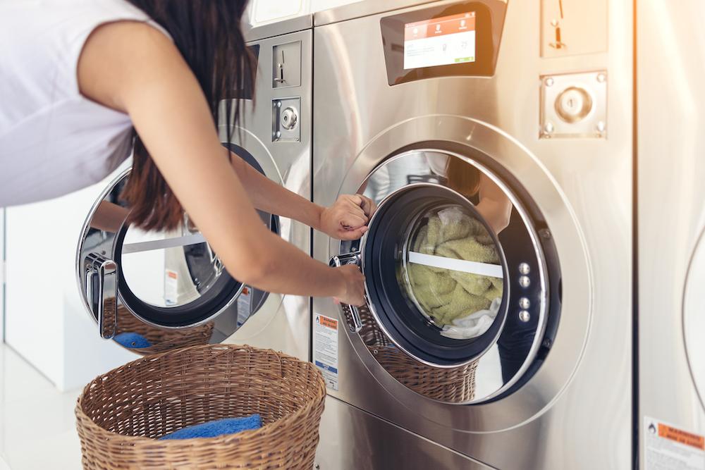 A woman using a dryer