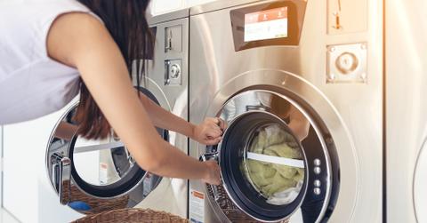 A woman using a dryer