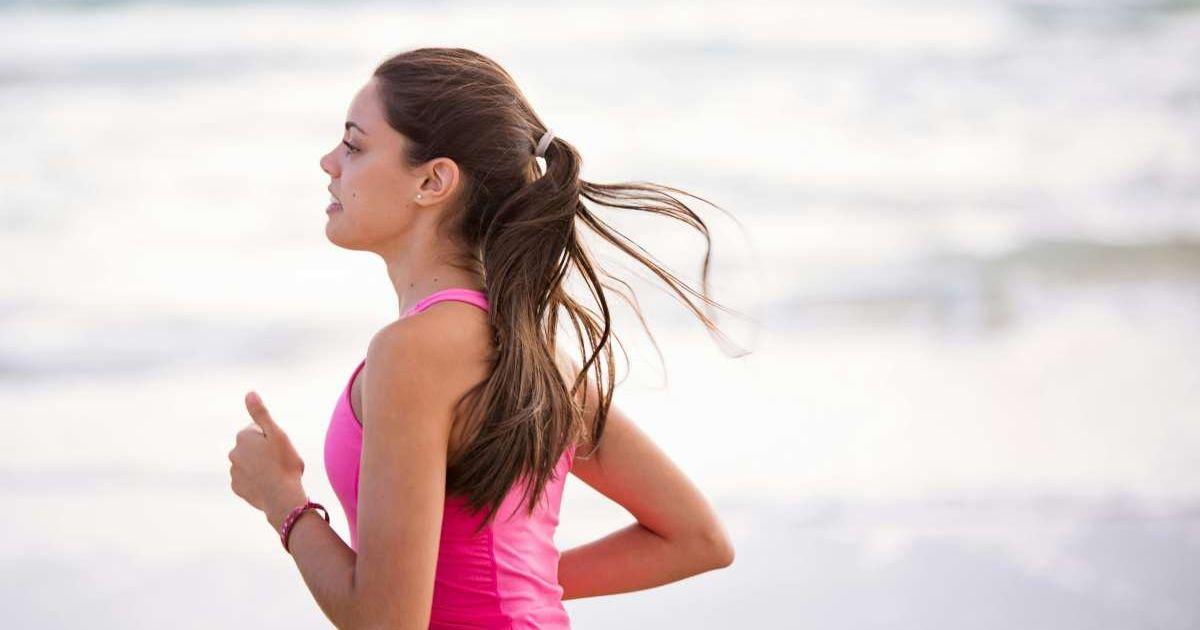 Woman in pink activewear running in the morning. (Representative Cover Image Source: Pexels | Nathan Cowley)