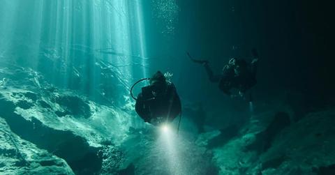 Representative image of a diver exploring underwater ruins. (Cover Image Source: Pexels | Francisco Davids)
