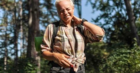 A woman slapping her neck to kill a mosquito. (Representative Cover Image Source: Getty Images | Zorica Nastasic)