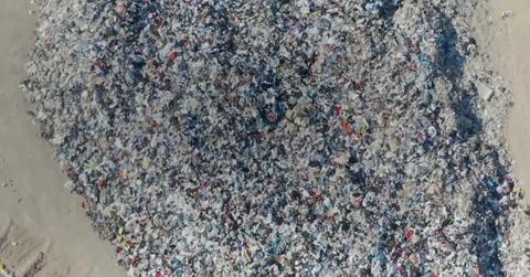 Arial footage of "fast fashion graveyard" in Atacama Desert, Chile