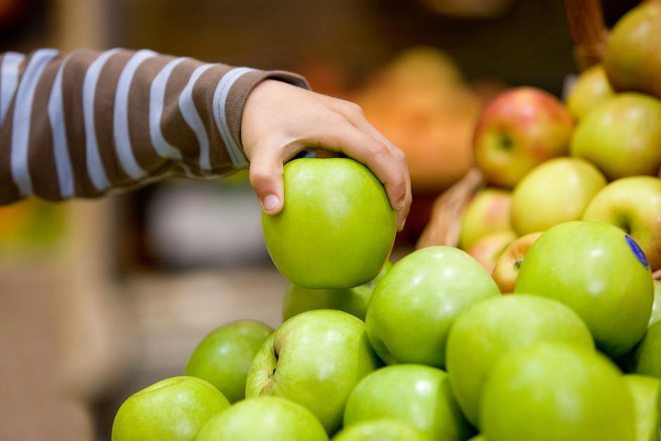 Person picking apple