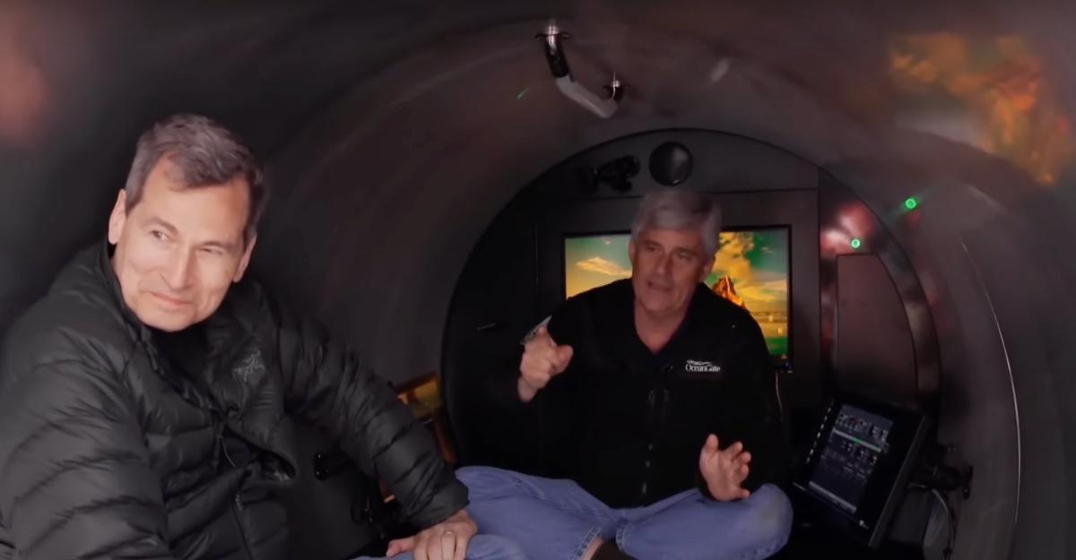 CBS News correspondent David Pogue and OceanGate CEO Stockton Rush inside the Titan in November 2022.