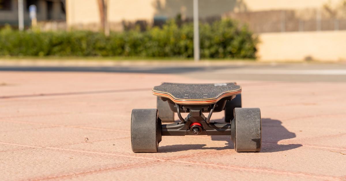 Front view of electric skateboard or longboard on city street