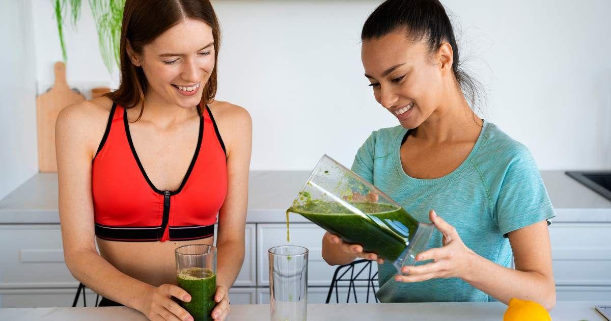 Two women making green colored juice from healthy ingredients. (Representative Cover Image Source: Freepik | freepik)