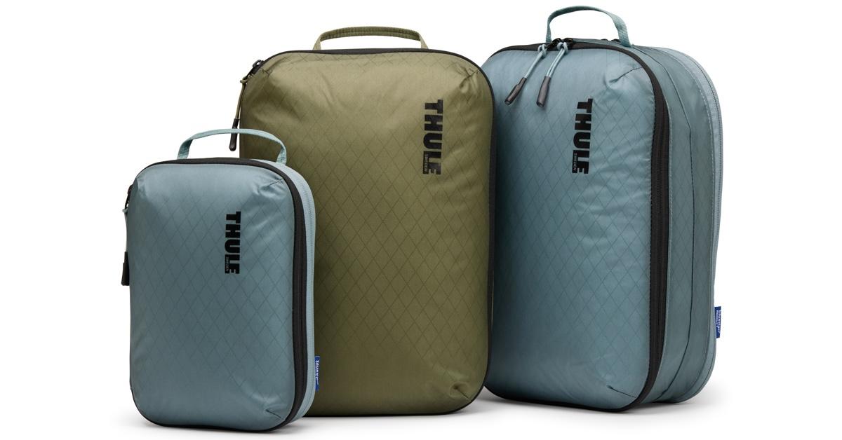 Three Thule packing cubes on white background