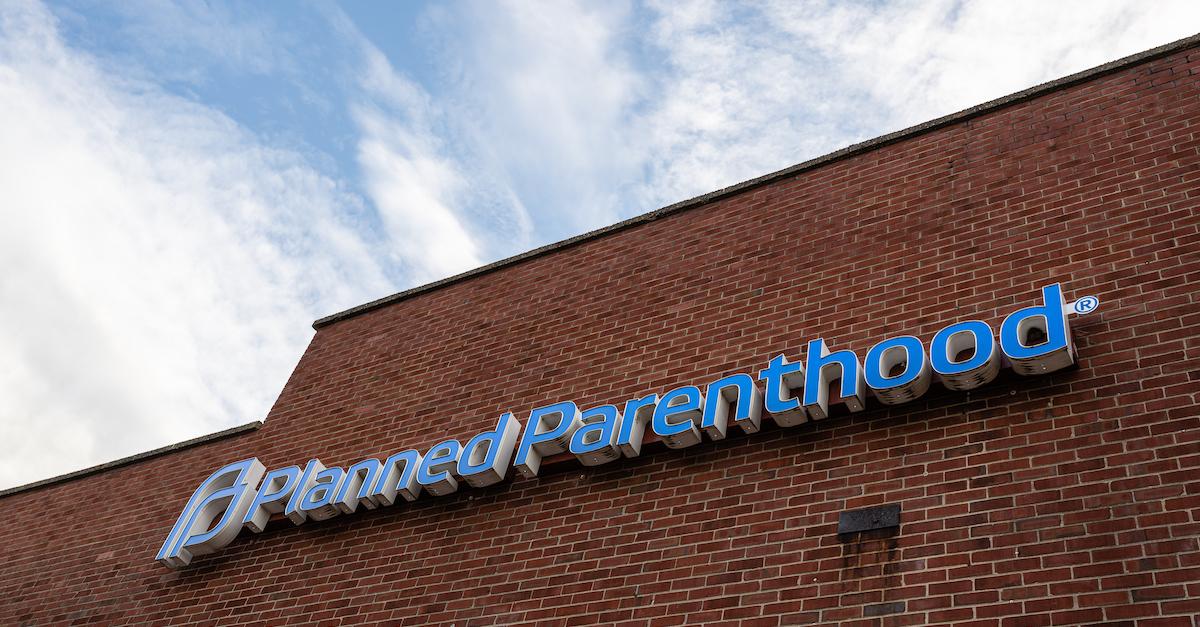 Planned Parenthood facade on a brick building.